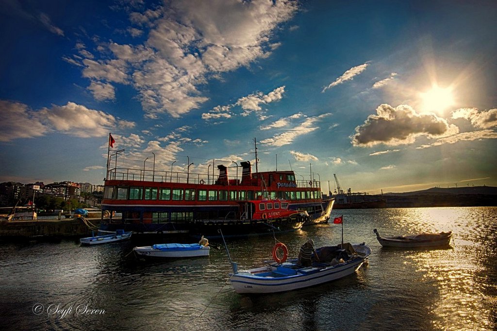 Bak bat�yor yine ak�am g�ne�i . . .