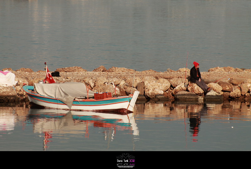 ::: ... KIRMIZI BALIKLI ADAM ... :::