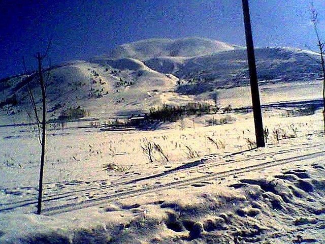 uzaklarda bir  iftlik